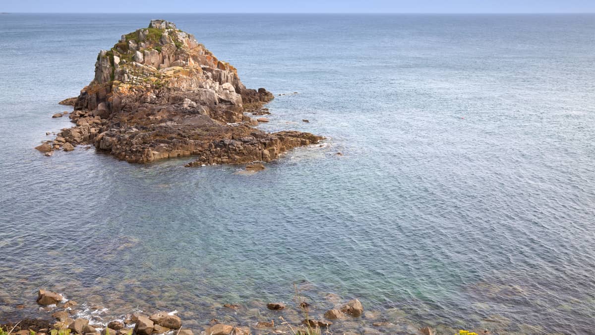 rocky island coastline sea