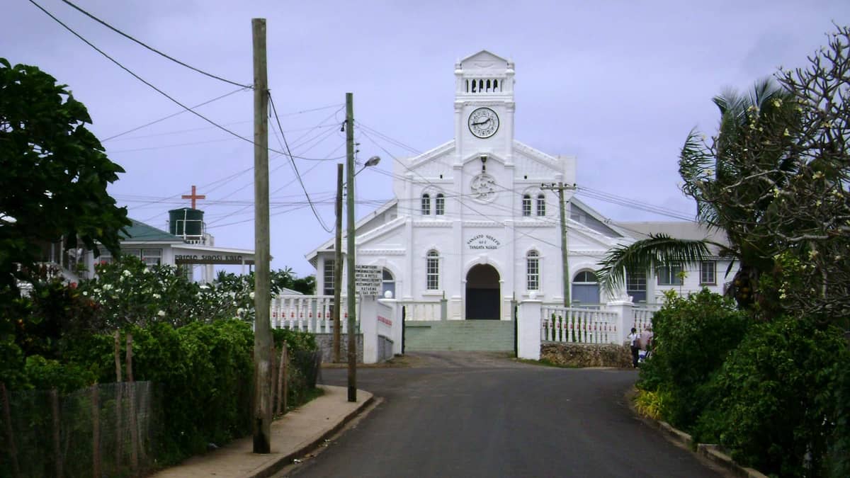 white church clock tower tropical