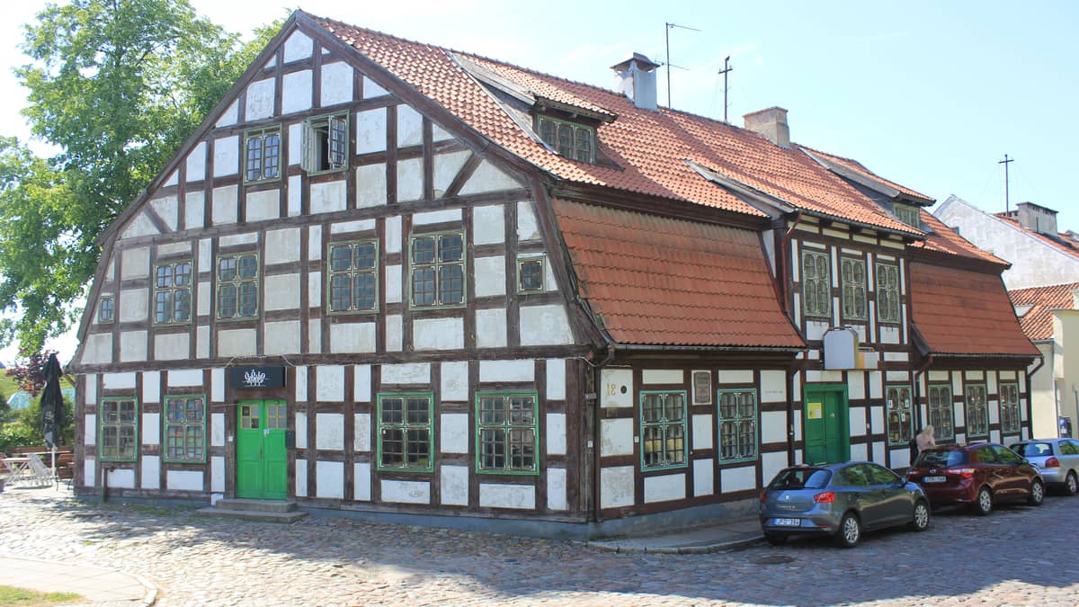 historic building facade cobblestone street