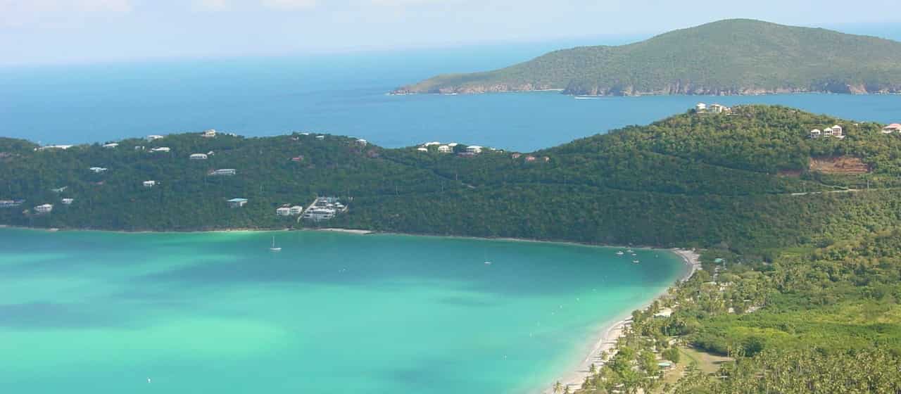 tropical bay coastline hills