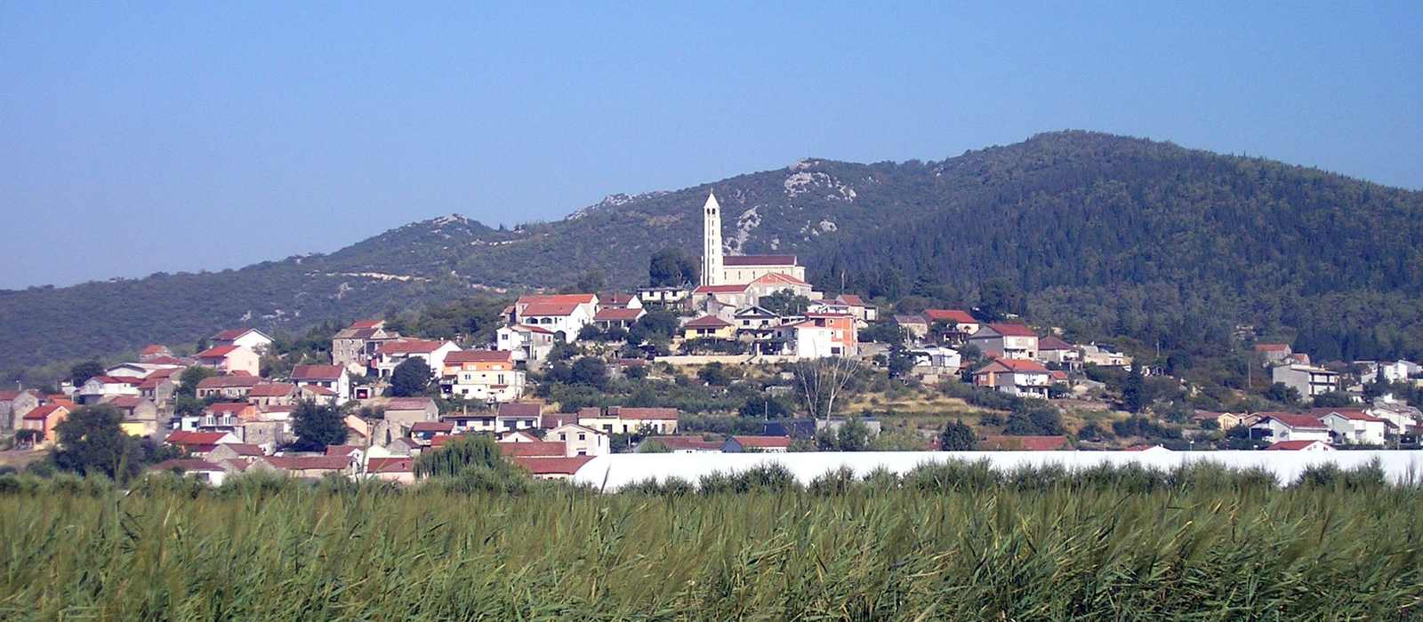 village on hill with church