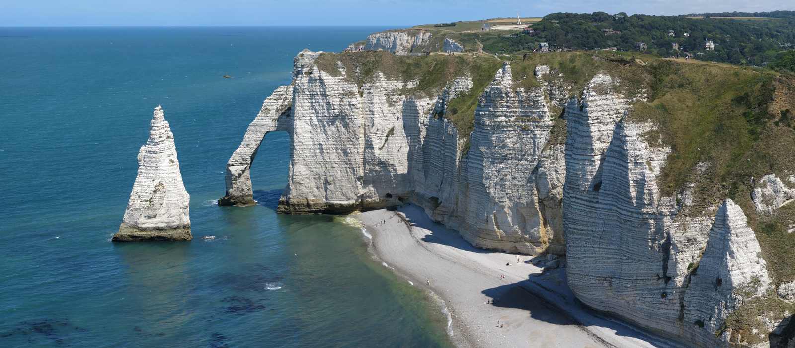 chalk cliffs coastline arch sea