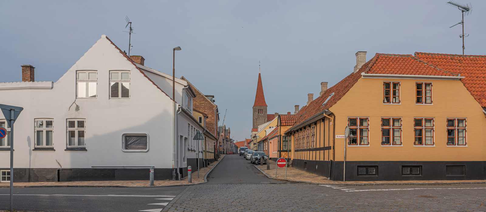 old town street with church spire
