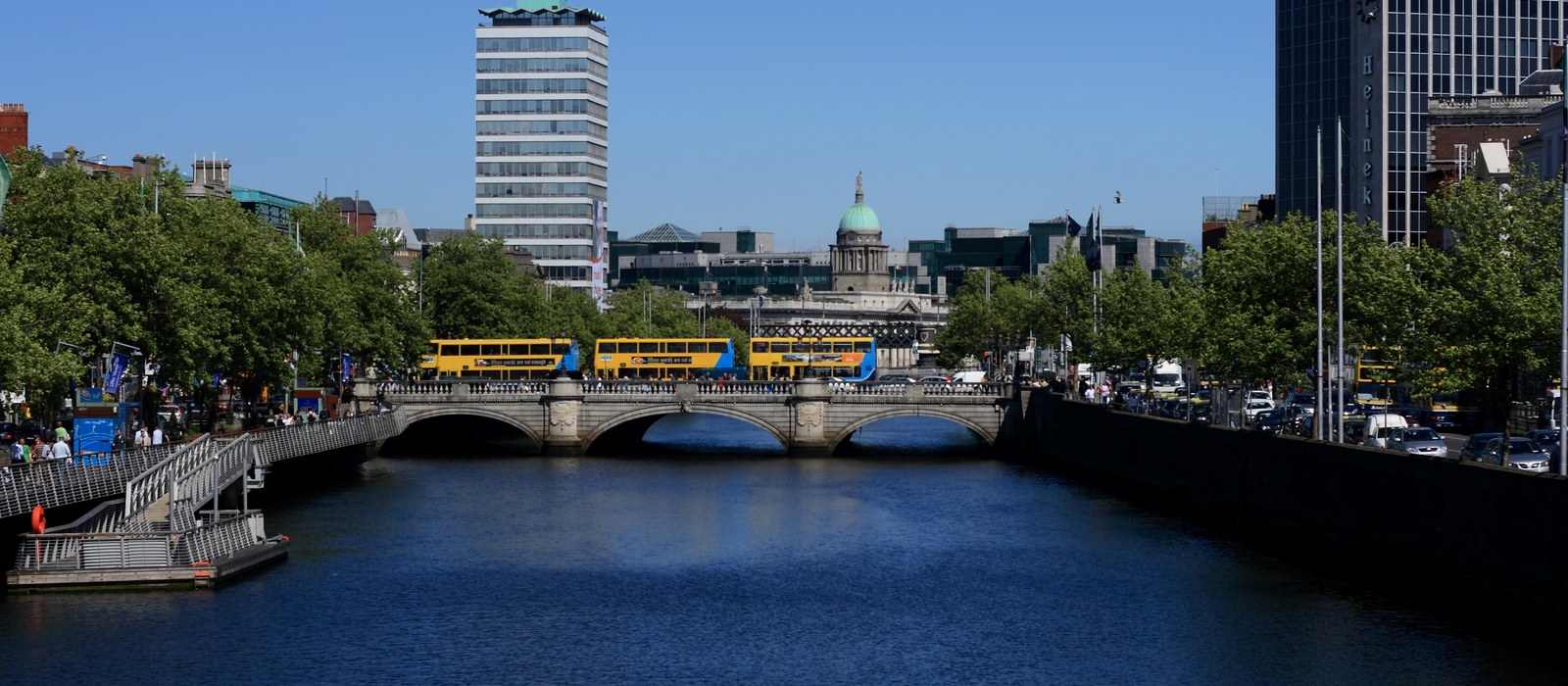 cityscape river bridge buildings