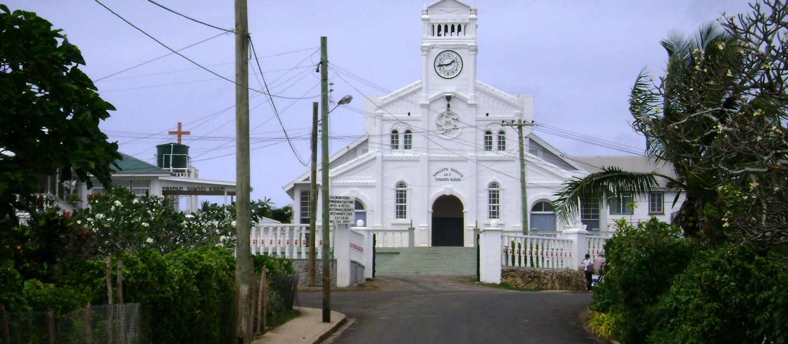 white church clock tower tropical