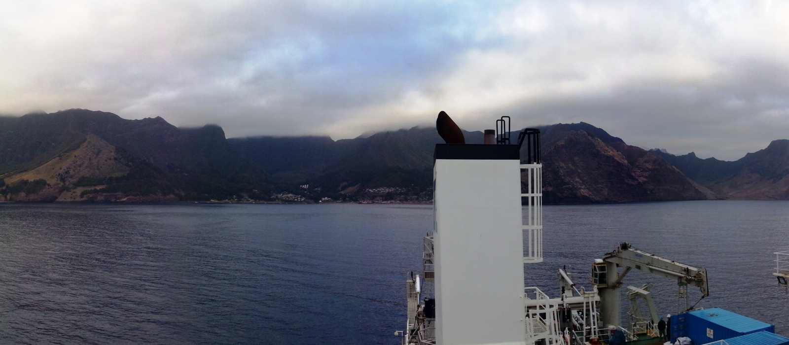 island coastline sea ship
