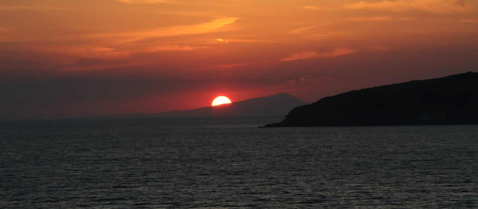 sunset ocean islands coastline