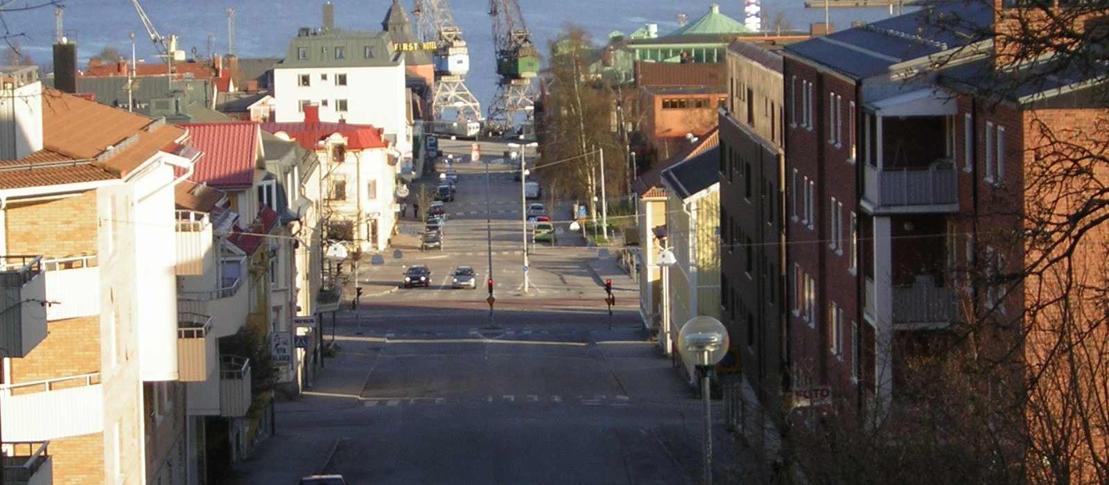 cityscape harbor cranes buildings