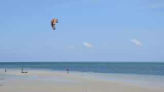 beach ocean kite surfer