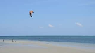 beach ocean kite surfer