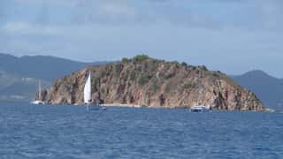 island coastline sailboats ocean