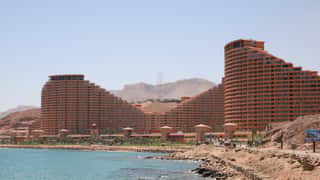 resort buildings coastline mountains