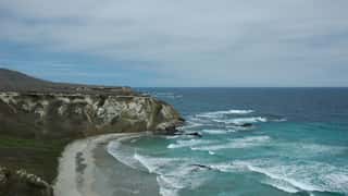 coastline beach ocean cliffs
