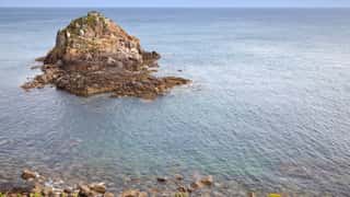 rocky island coastline sea