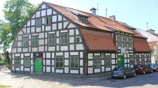 historic building facade cobblestone street