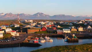 coastal town harbor mountains