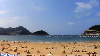 beach bay cityscape hills