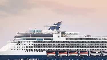 A large cruise ship sails on the water - Celebrity Millennium, Celebrity Cruises