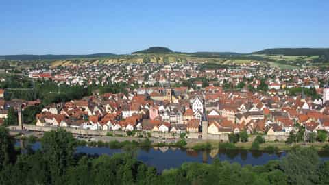 cityscape river old town hills