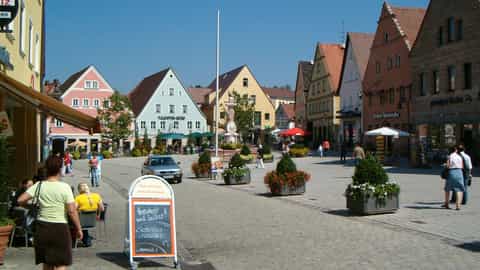 town square buildings cobblestone street