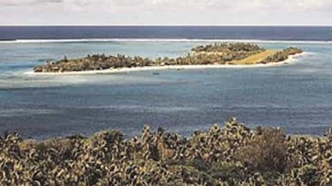island coastline ocean vegetation