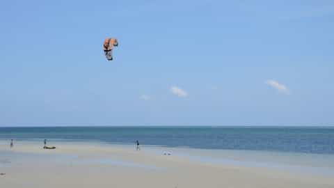 beach ocean kite surfer