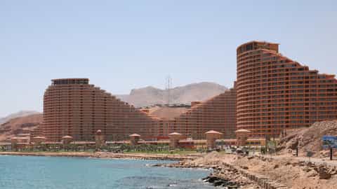resort buildings coastline mountains