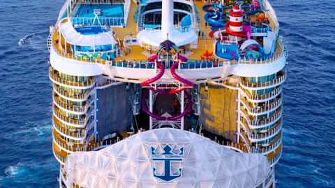 Aerial view of a large cruise ship sailing on the ocean - Utopia Of The Seas, Royal Caribbean