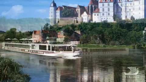 A river ship sails past a castle on a hill - Viking Beyla, Viking River Cruises