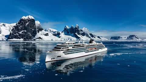 A cruise ship sails through icy waters in Antarctica - Viking Polaris, Viking Cruises