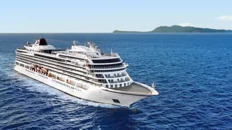 A large white cruise ship sails on the blue ocean - Viking Vesta, Viking Cruises