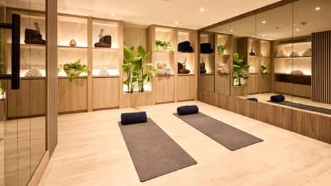 A room with two yoga mats and rolled towels - VIVA Enjoy, Viva Cruises