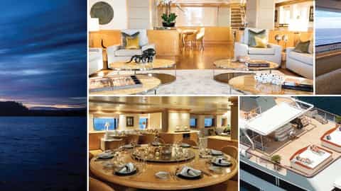 A yacht's stern is lit up at night with a dining setup - Aqua Blu, Uniworld