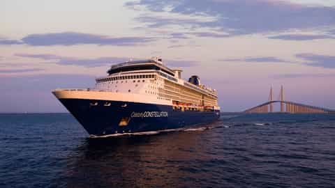 A large cruise ship sails on the water at sunset - Celebrity Constellation, Celebrity Cruises