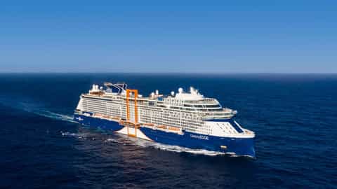 A large cruise ship sails on the blue ocean - Celebrity Edge, Celebrity Cruises