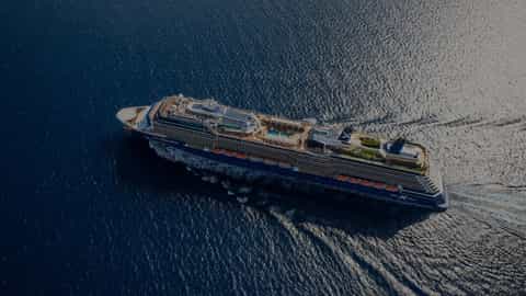 Aerial view of a large cruise ship sailing on the ocean - Celebrity Equinox, Celebrity Cruises