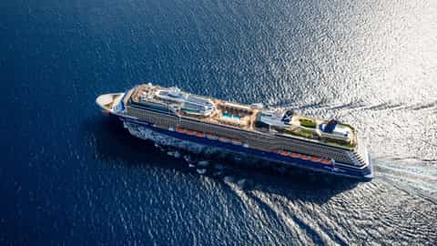 Aerial view of a large cruise ship sailing on the ocean - Celebrity Equinox, Celebrity Cruises