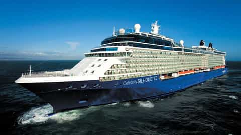 A large blue cruise ship sails on the ocean - Celebrity Silhouette, Celebrity Cruises