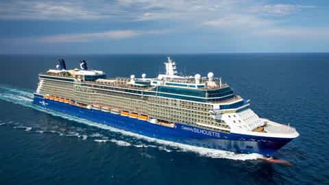 A large blue cruise ship sails on the ocean - Celebrity Silhouette, Celebrity Cruises