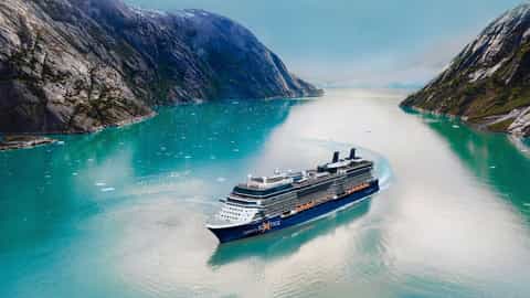 A cruise ship sails through a scenic Alaskan fjord - Celebrity Solstice, Celebrity Cruises