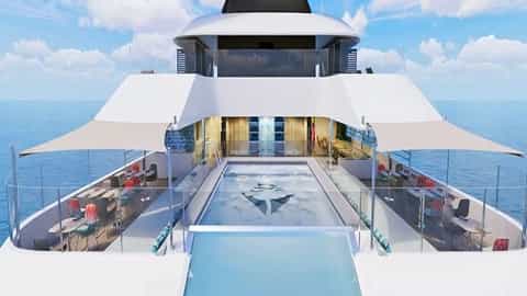 A modern yacht with a pool and outdoor seating - Emerald Kaia, Emerald Cruises