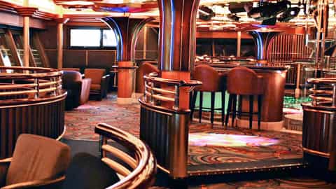 A bar lounge with seating and a bar area - Emerald Princess, Princess Cruises
