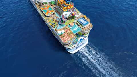 Aerial view of a large cruise ship with a waterpark - Hero Of The Seas, Royal Caribbean