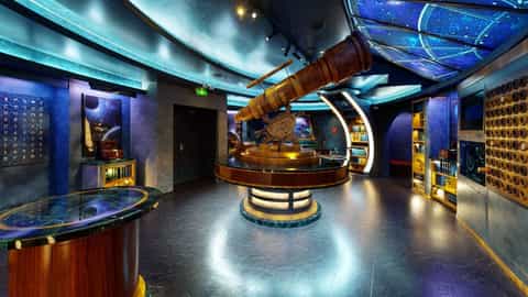 An observatory-themed lounge with a telescope - Independence Of The Seas, Royal Caribbean