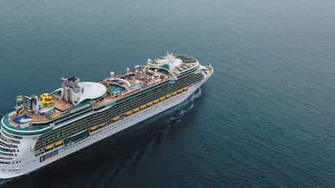 A large cruise ship sails on the ocean - Independence Of The Seas, Royal Caribbean