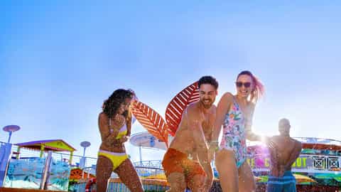 People splash water on a sunny day on a ship deck - Liberty Of The Seas, Royal Caribbean