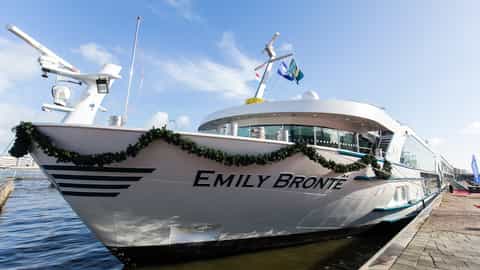 A ship's bow is decorated with garland - MS Emily Bronte, Riviera Travel