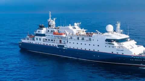 A large ship sails on the blue ocean - ms La Belle des Oceans, CroisiEurope