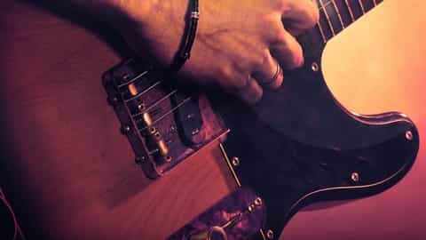 A person plays an electric guitar - MSC Euribia, MSC Cruises