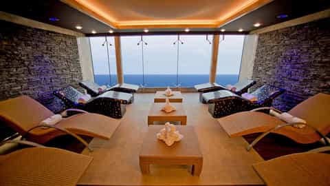 Spa lounge with chaise lounges and ocean views - MSC Fantasia, MSC Cruises